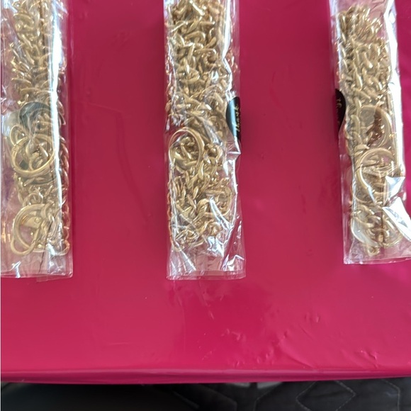 Other - Gold tone wallet Extension Brand New. 2 Whites and 1 Black with the letter C